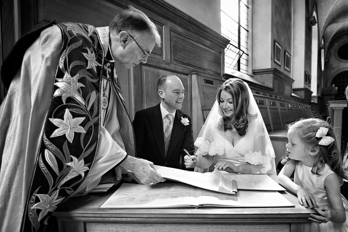 Register signing in St Brides church wedding