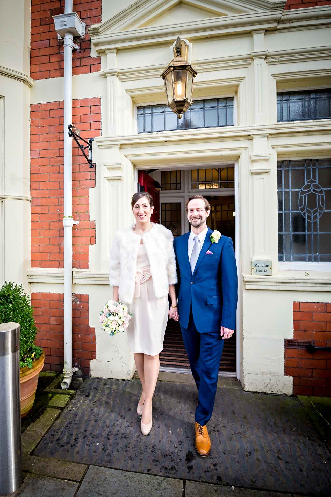 Bride and Groom Exiting Mansion House in Newport