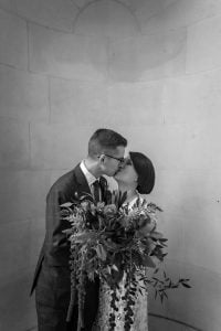 Couple kiss in an alcove at London Business School next to Old Marylebone Town Hall